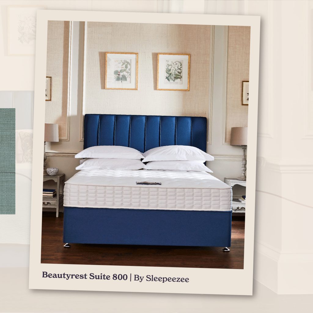 A polaroid style image of the Sleepeezee Beautyrest Suite 800, showing the bare mattress on a navy blue divan