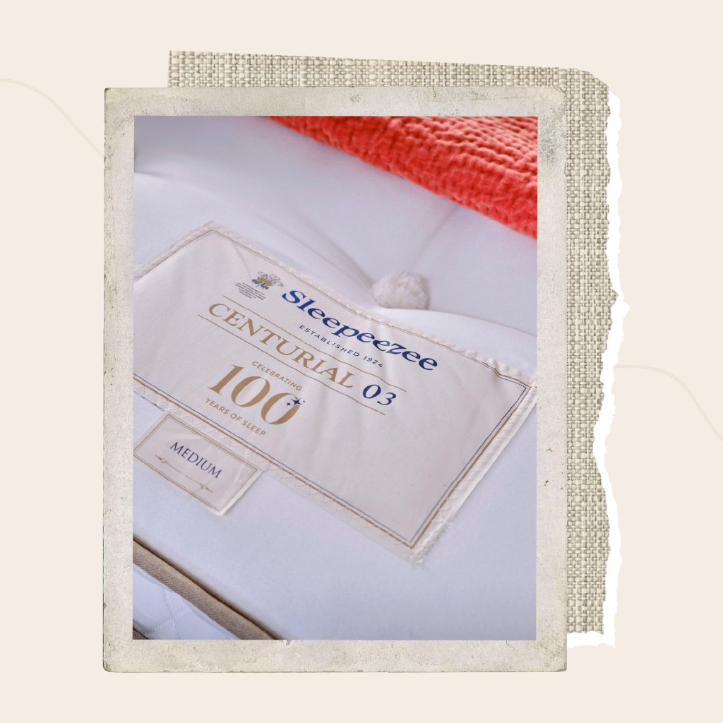 A close up photograph of the Sleepeezee logo on a Centurial 03 mattress