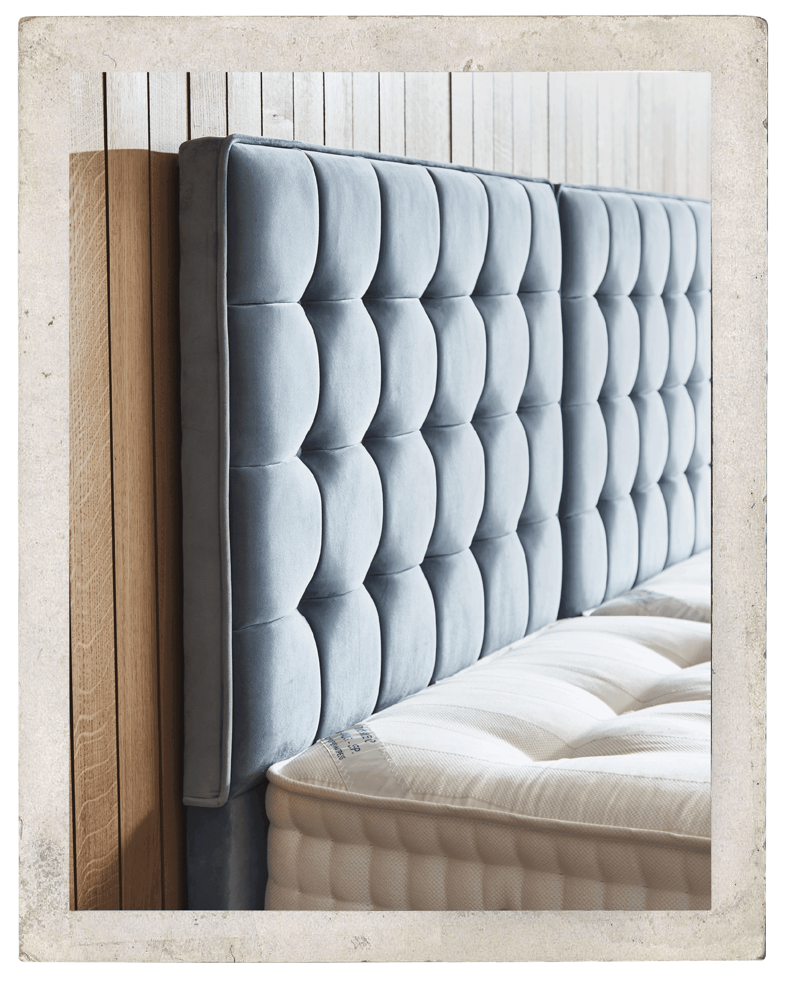 A close up shot of a padded headboard